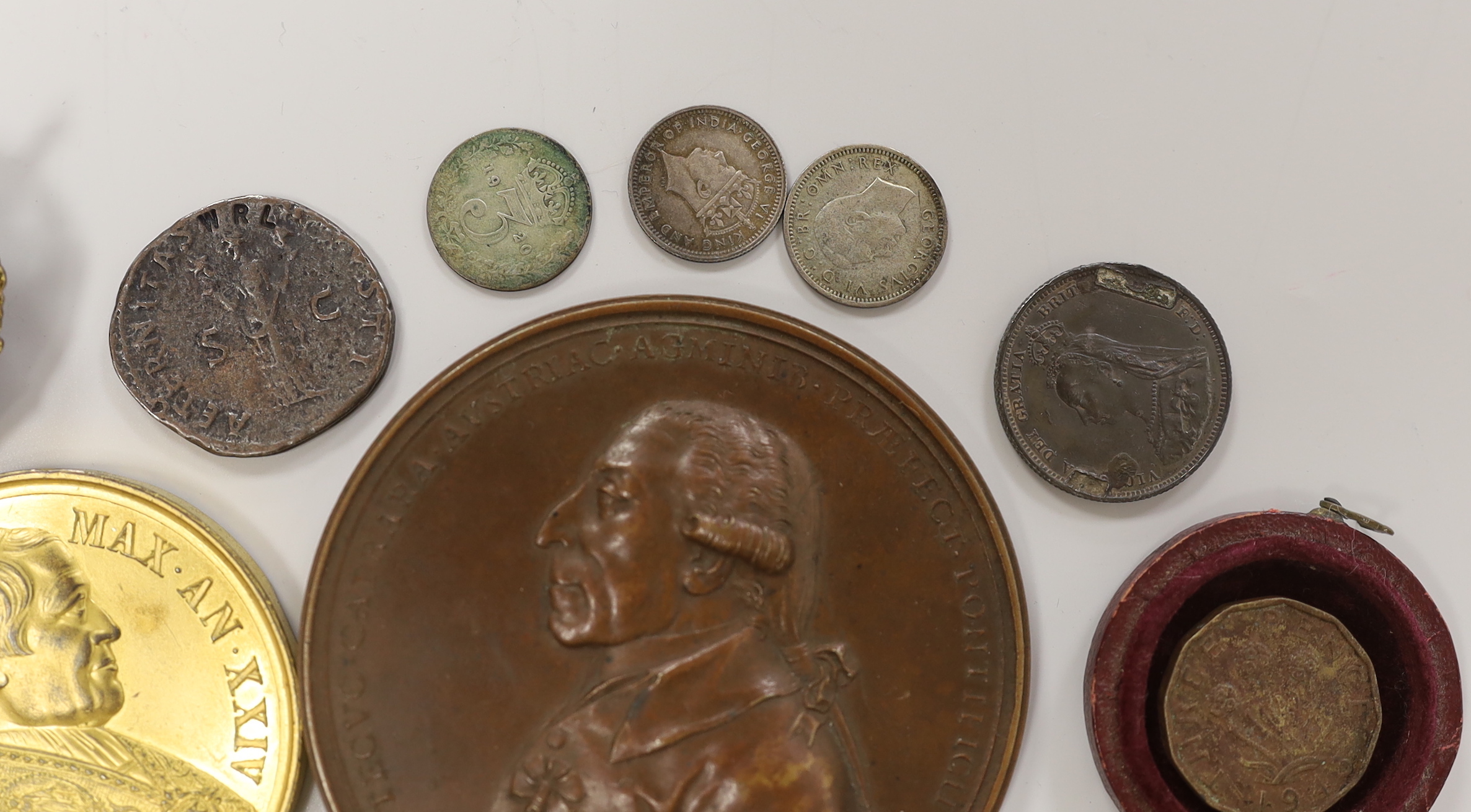 A quantity of mixed coinage, medals, badges etc.